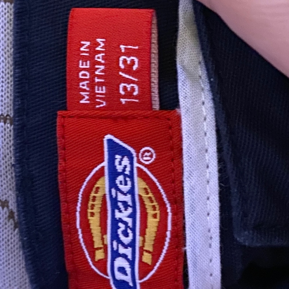 dark blue and black womans dickies